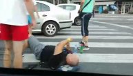 Udes na Tošinom bunaru, muškarac leži na ulici
