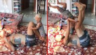 Beba rođeni gimnastičar! Pravi salto kao šampion, a tek šta radi na tatinim nogama