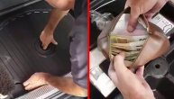 Snimljen trenutak kad carinik pronalazi skrivene pare u autu