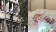 Pijani otac hteo da baci bebu kroz prozor, tada se na fasadu popeo policajac