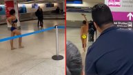 Kao od majke rođena! Devojka lagano izvela striptiz i prošetala se gola aerodromom