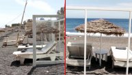 Niko nije srećan ali se mora: Na plažama u Grčkoj prve ležaljke ograđene pleksiglasom
