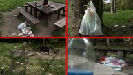 Prazne flaše i čaše, razbacane kese i papiri posle prvomajskog uranka na Košutnjaku