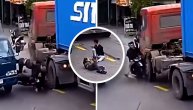 Svi se pitaju kako su preživeli: Skuterom uleteli u sendvič između 2 teretnjaka i ostali nepovređeni