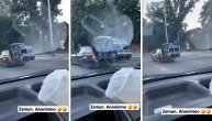 Pokušao da ugura sedam buradi u auto: Urnebesan snimak iz Zemun