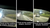 Čovek sa ugašenim farovima vozi auto-putem kroz Beograd