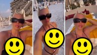 Karleuša čim je stigla u Dubai spičila na plažu: Grudi kipe iz bikinija uz zanimljiv filter na licu