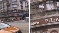 Prolaznici šokirani prizorom u centru prestonice: Iz stana smeće ispada na ulicu