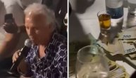 "Pršti" kafana, sto se lomi od evrića: Muharem Serbezovski peva i dobija bakšiš
