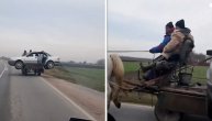 Luda scena sa drumova Srbije: Zaprežna kola nose automobil
