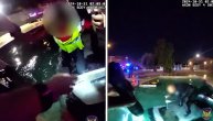 Snimak spasavanja čoveka iz potonulog vozila u bazenu