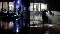 Spasavanje iz poplavljene kuće